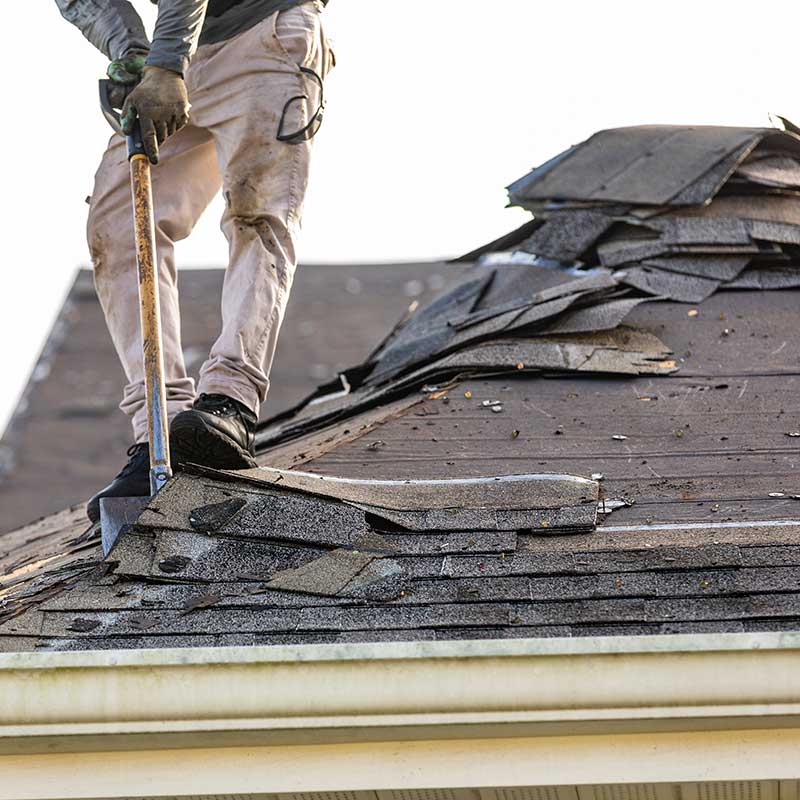 roofing under construction being pulled apart